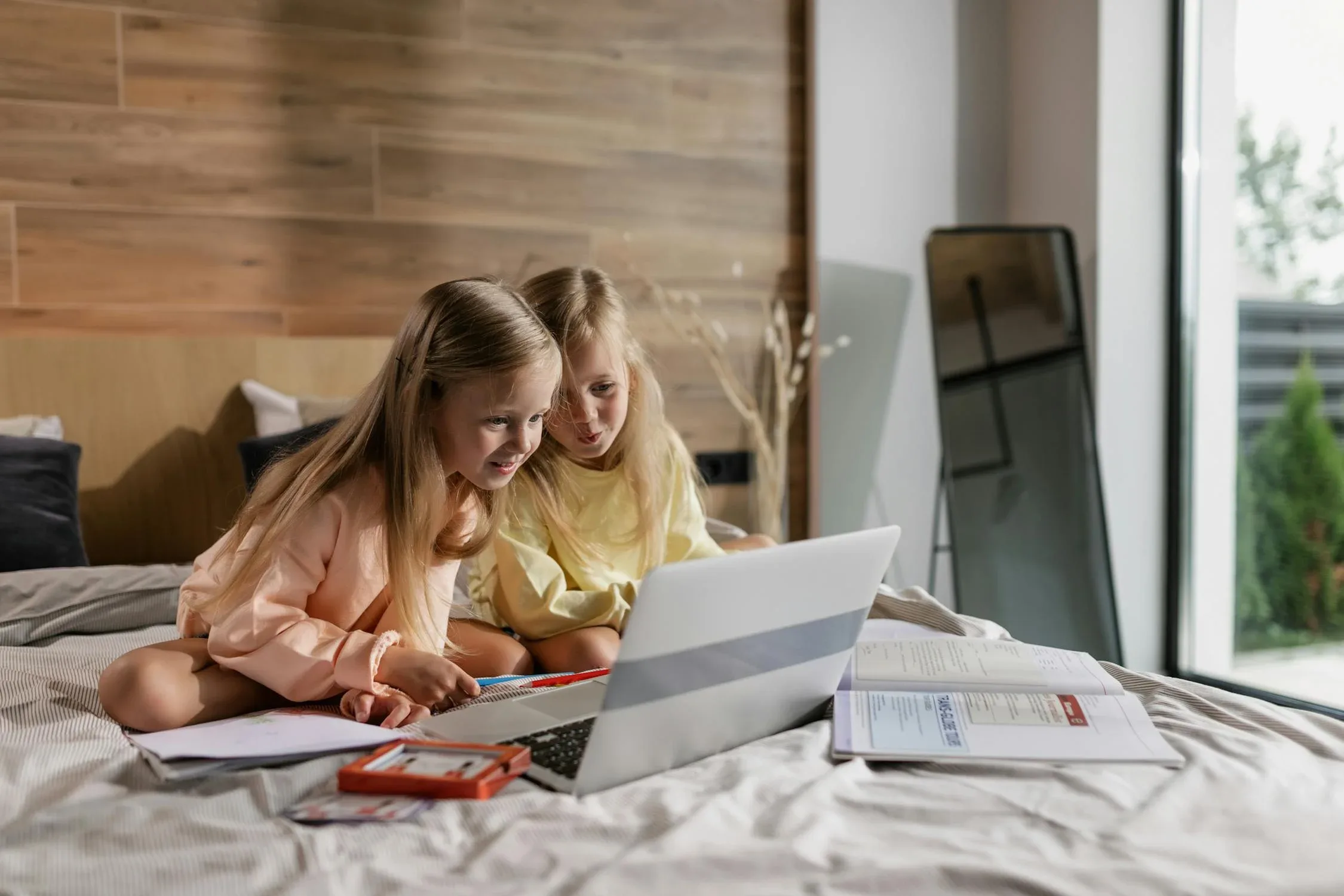 two girls studing on laptop